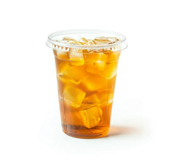 dark coffee served in glass with lots of ice cubes in it